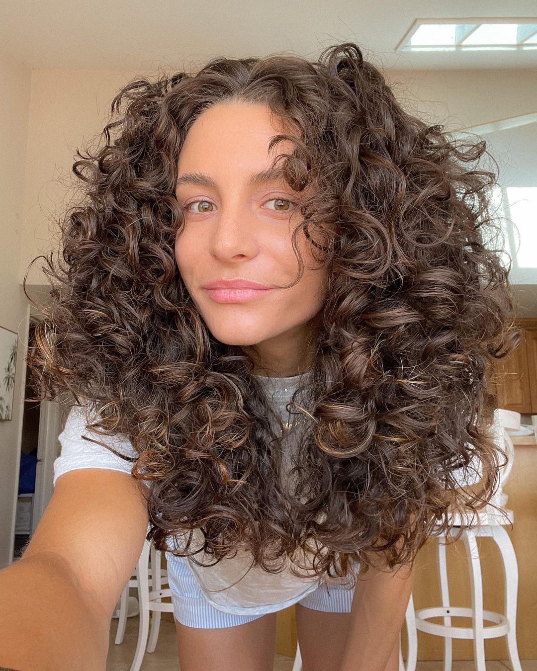 How to Use Mousse for Defined, Voluminous Curls